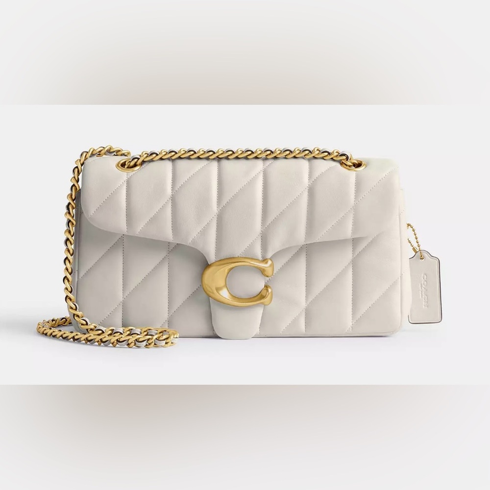 COACH Elegant Cream Leather Handbag with Gold Accents TABBY